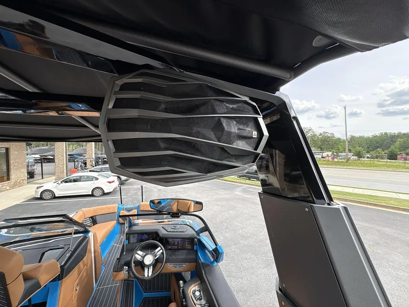 Slide: The Image of 2021 Nautique Super Air Nautique G23 Paragon interior with advanced sound system and luxury seating. - 17