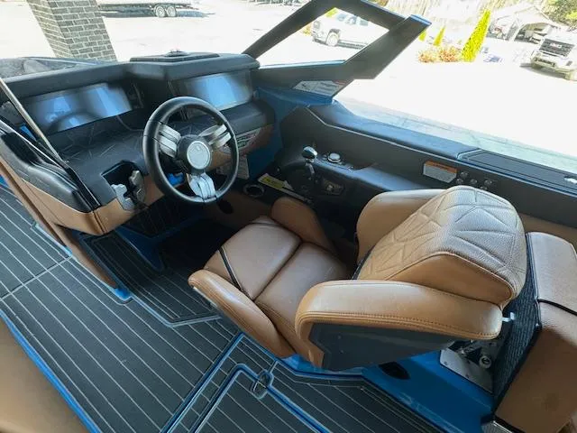 Slide: The Image of 2021 Nautique Super Air Nautique G23 Paragon interior with leather seats and modern dashboard. - 33