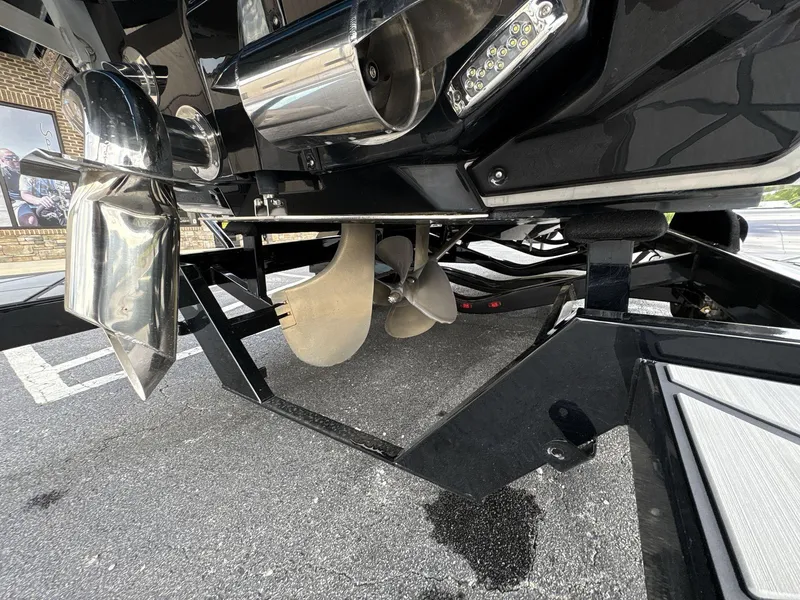 Slide: The Image of 2021 Nautique Super Air Nautique G23 Paragon boat propeller and exhaust detail. - 7