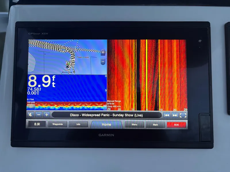 Slide: The Image of Garmin GPS display on 2020 Canyon Bay 24H boat showing depth and sonar data. - 15