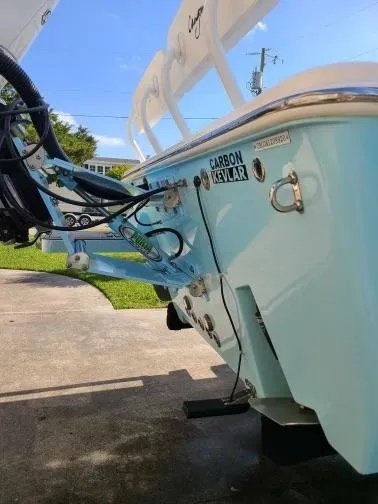 Slide: The Image of 2020 Canyon Bay 24H boat with Carbon Kevlar hull, parked on concrete. - 22