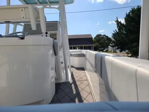 Slide: The Image of 2020 Canyon Bay 24H boat interior with sleek design and spacious deck. - 5