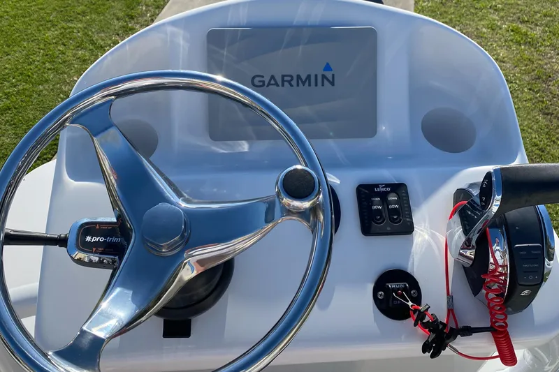 Slide: The Image of Boat console of 2020 Canyon Bay 24H with Garmin display and steering wheel. - 8