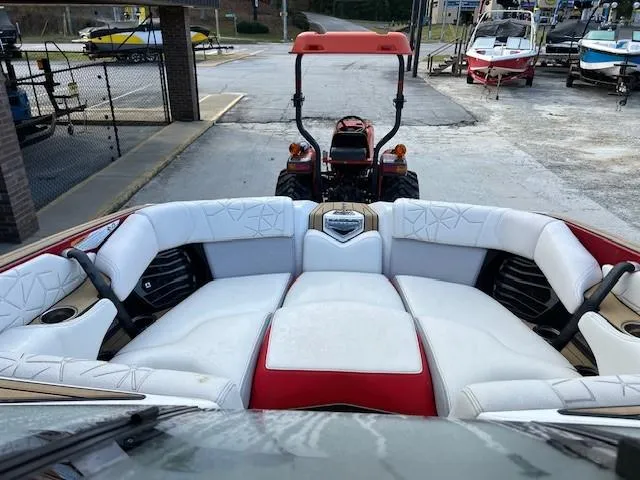 Slide: The Image of 2021 Nautique Super Air Nautique G23 Paragon with luxurious white and red seating. - 4