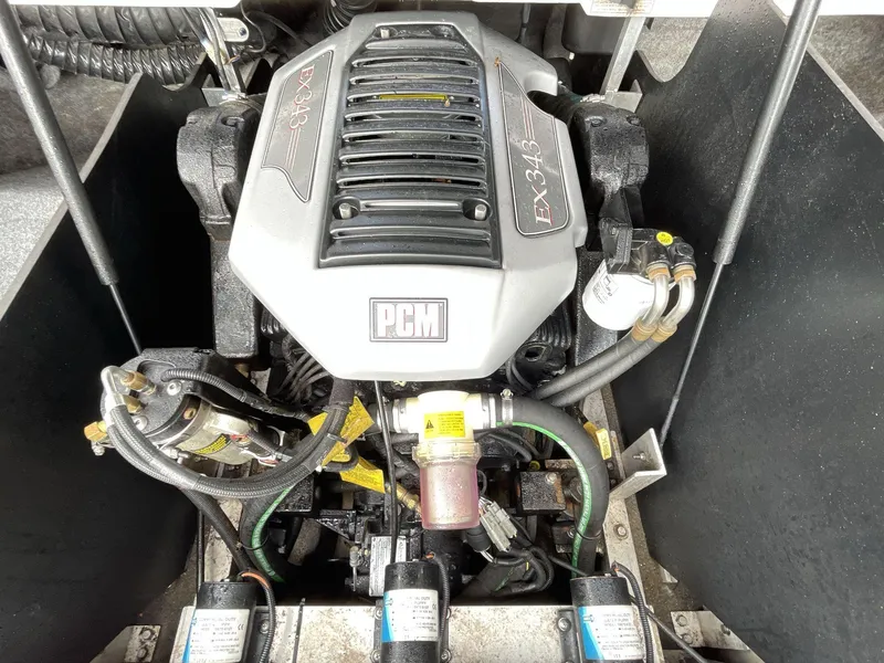 Slide: The Image of Engine of 2011 Nautique Super Air Nautique 230 boat, featuring PCM EX343 model. - 19