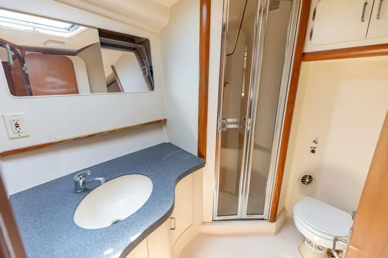 Slide: The Image of 2002 Luhrs 40 Convertible- Trigger Happy- Head - 13