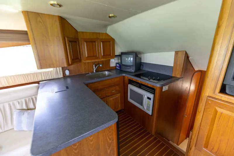 Slide: The Image of 2002 Luhrs 40 Convertible- Trigger Happy- Galley - 9