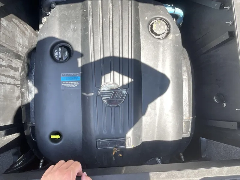 Slide: The Image of 2022 Malibu Wakesetter 23 LSV engine compartment with Monsoon cover. - 14