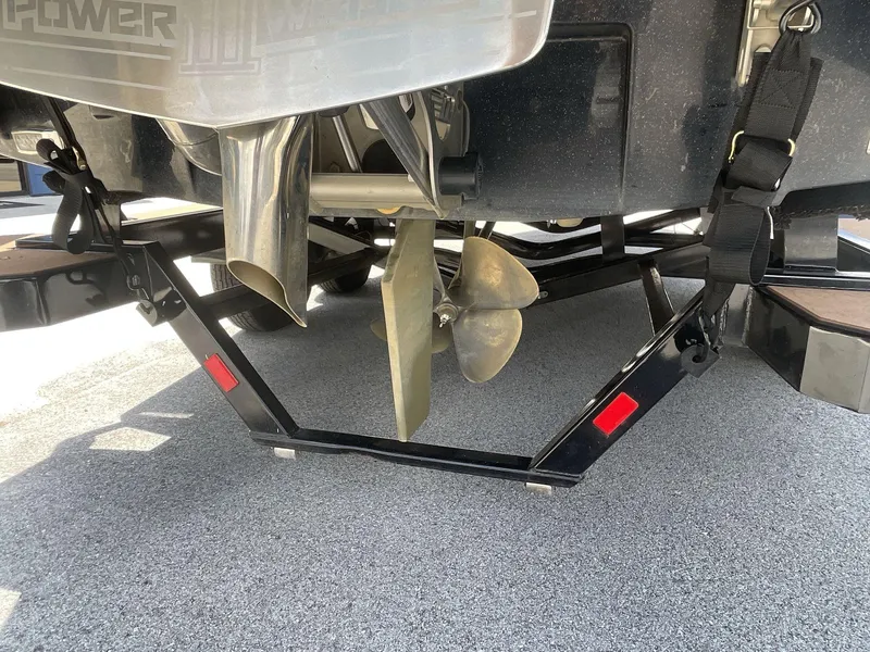 Slide: The Image of 2022 Malibu Wakesetter 23 LSV boat propeller and trailer detail. - 8