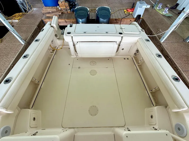 Slide: The Image of 2018 Grady-White Marlin 300 boat deck, spacious and well-equipped for fishing. - 27