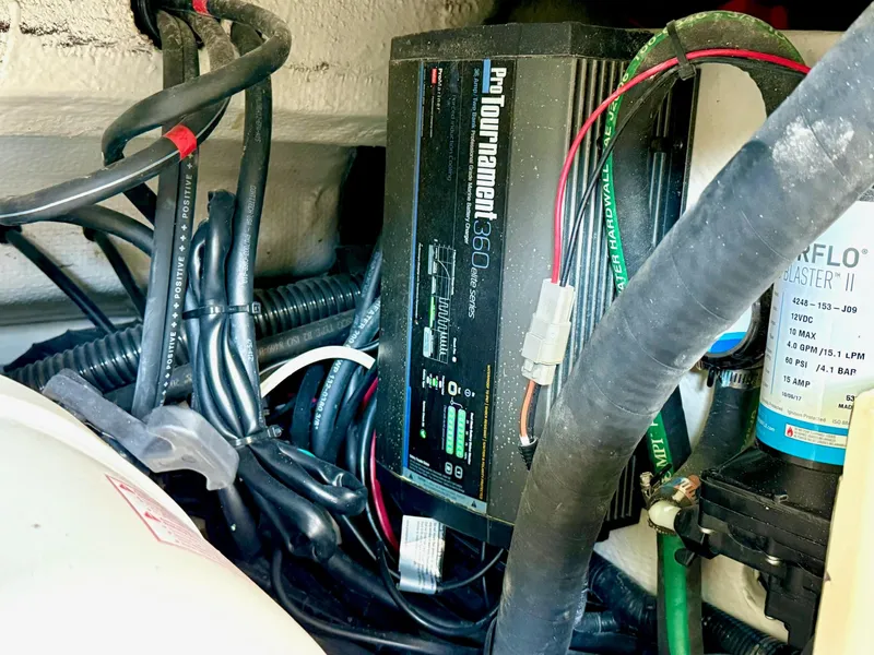 Slide: The Image of Electrical wiring and components inside a 2018 Grady-White Marlin 300 boat. - 45