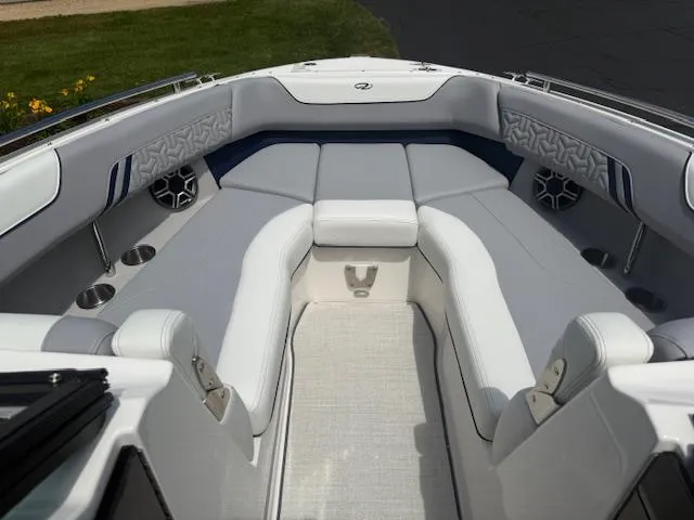 Slide: The Image of Luxurious interior of 2026 Regal LS6 boat with plush seating and modern design. - 17