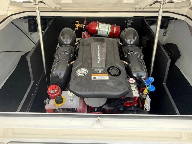 Slide: The Image of Engine compartment of a 2026 Regal LS6 boat, featuring a Volvo Penta engine. - 25