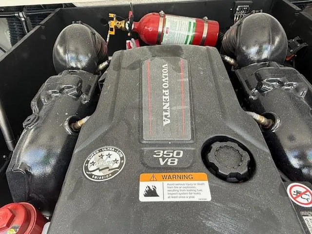 Slide: The Image of Engine compartment of a 2026 Regal LS6 with Volvo Penta 350 V8 engine and fire extinguisher. - 27