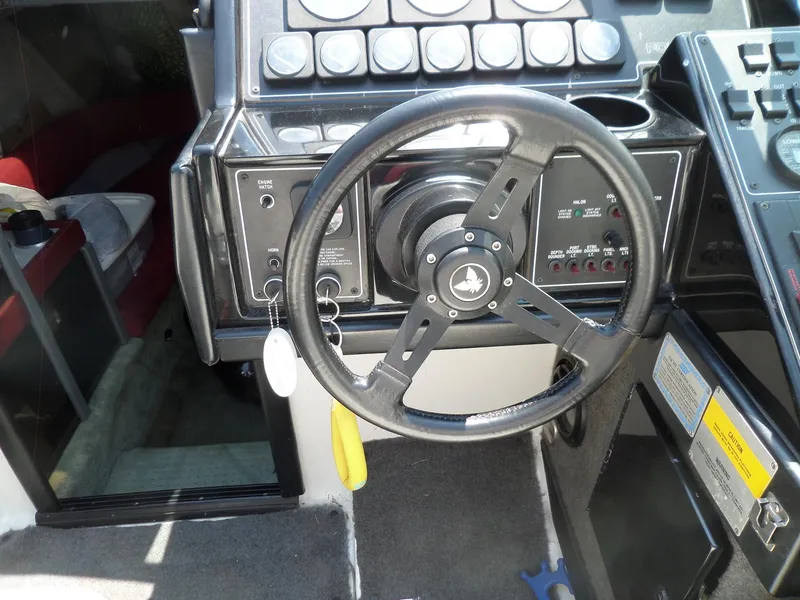 Slide: The Image of Steering wheel and dashboard of a 1989 Formula F272 SR 1 boat. - 10