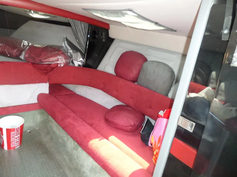 Slide: The Image of Interior of 1989 Formula F272 SR 1 boat with red seating and Ohio State bucket. - 15