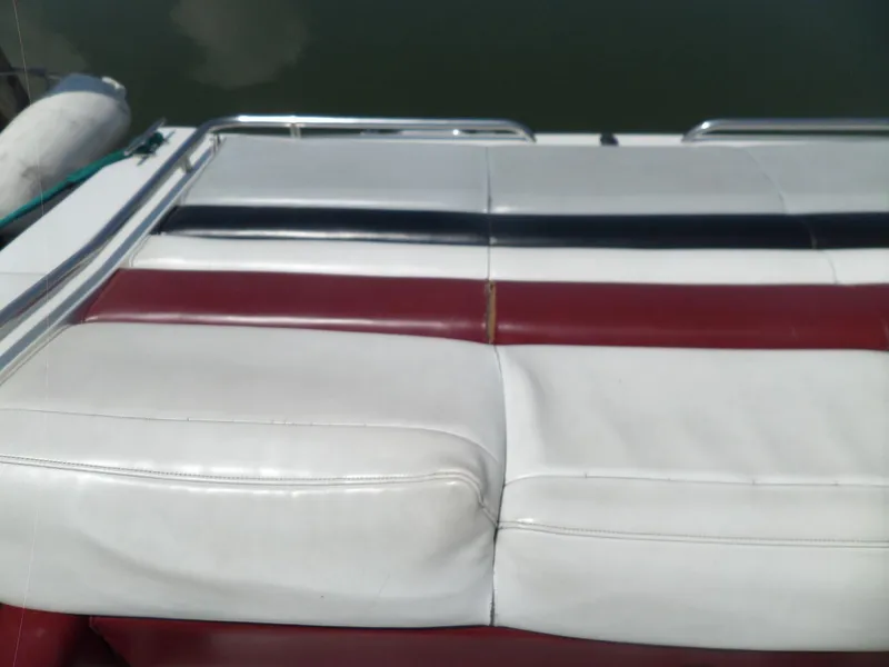 Slide: The Image of Upholstered seating on 1989 Formula F272 SR 1 boat, featuring red, white, and black colors. - 25