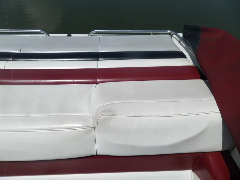 Slide: The Image of White and red seating on a 1989 Formula F272 SR 1 boat. - 26