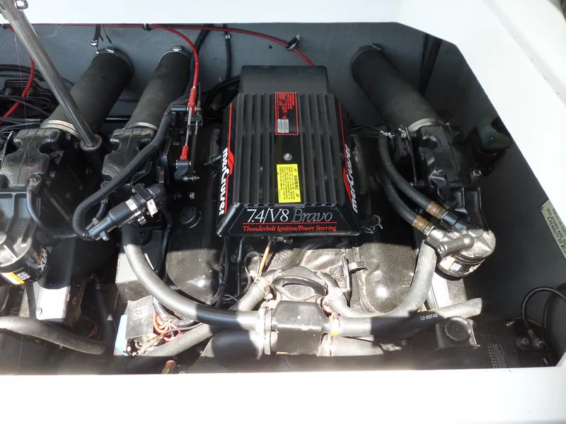Slide: The Image of Engine compartment of a 1989 Formula F272 SR 1 boat, featuring a MerCruiser 7.4L V8 Bravo. - 28