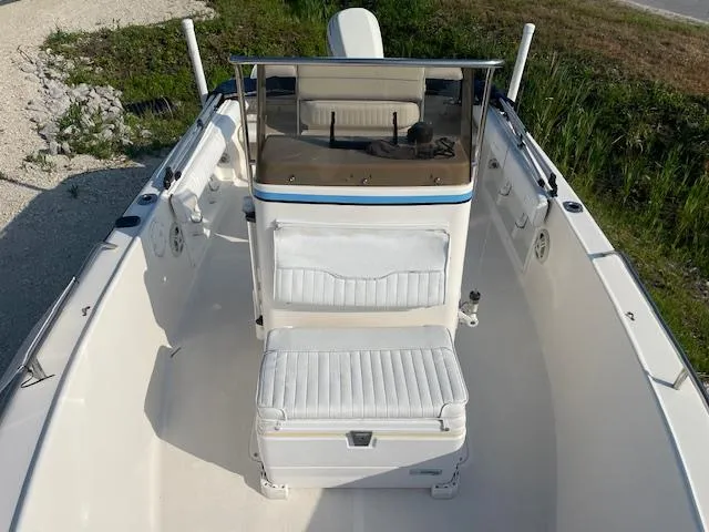 Slide: The Image of 2004 Sea Hunt Triton 186 boat interior with seating and console, viewed from above. - 3