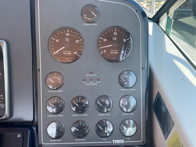 Slide: The Image of Instrument panel of a 1998 Tiara Yachts 3500 Open, displaying gauges and indicators. - 14