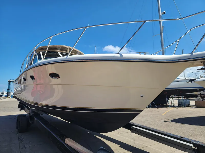 Slide: The Image of 1998 Tiara Yachts 3500 Open on trailer under clear blue sky. - 38