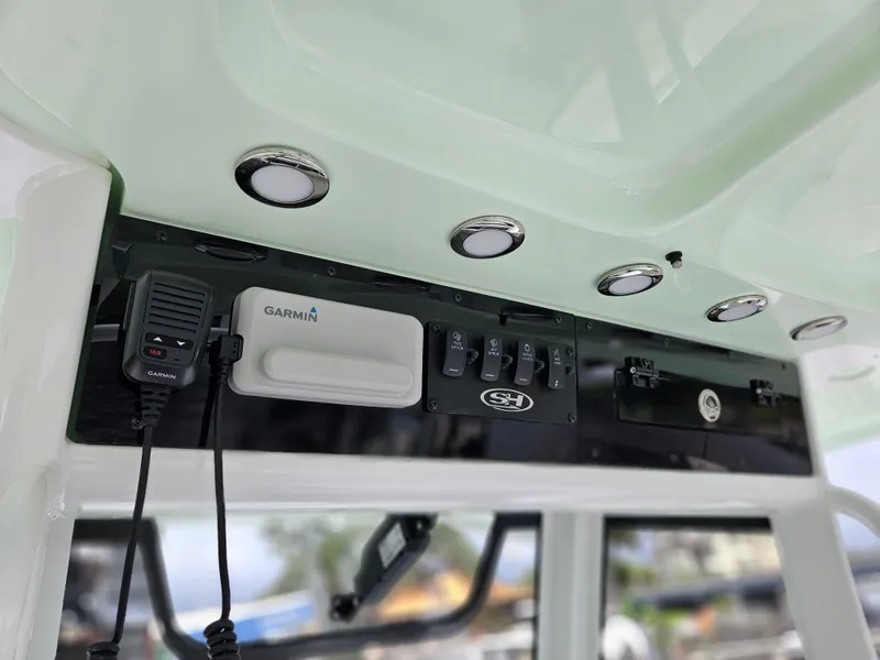 Slide: The Image of Control panel of 2025 Sea Hunt Gamefish 28 FS boat with Garmin equipment. - 18