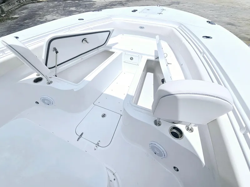 Slide: The Image of 2025 Sea Hunt Gamefish 28 FS boat interior with open storage compartments. - 27
