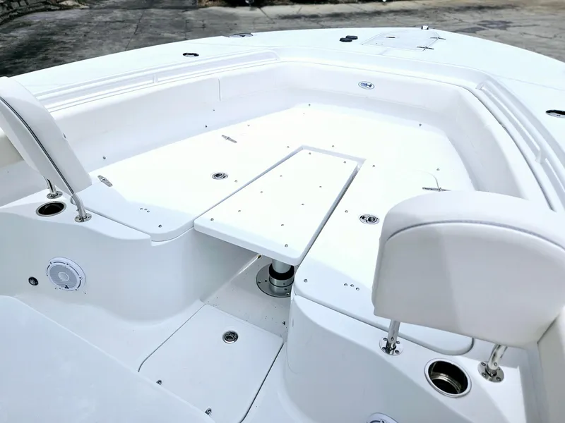 Slide: The Image of 2025 Sea Hunt Gamefish 28 FS boat interior with seating and storage compartments. - 32