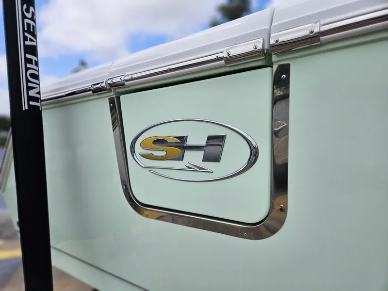 Slide: The Image of 2025 Sea Hunt Gamefish 28 FS boat logo detail. - 10