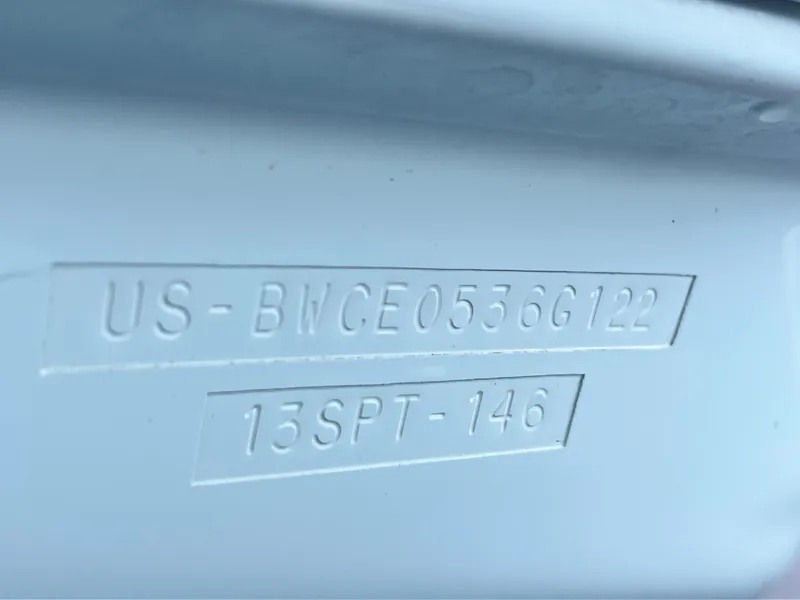 Slide: The Image of Hull identification number on a 2022 Boston Whaler 130 Super Sport boat. - 14