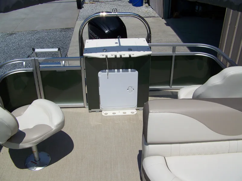 Slide: The Image of 2023 Avalon Venture Rear Fish boat interior with seating and fishing station. - 10
