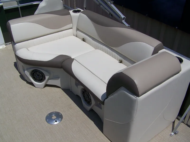 Slide: The Image of 2023 Avalon Venture Rear Fish 20' boat seating with beige and white upholstery. - 6