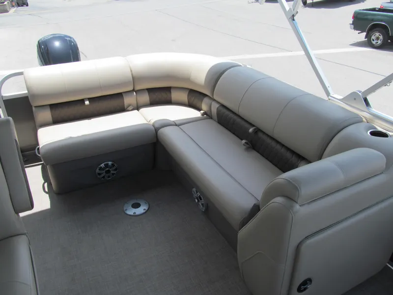 Slide: The Image of 2023 Sun Tracker Party Barge 20 DLX interior with plush seating and modern design. - 10