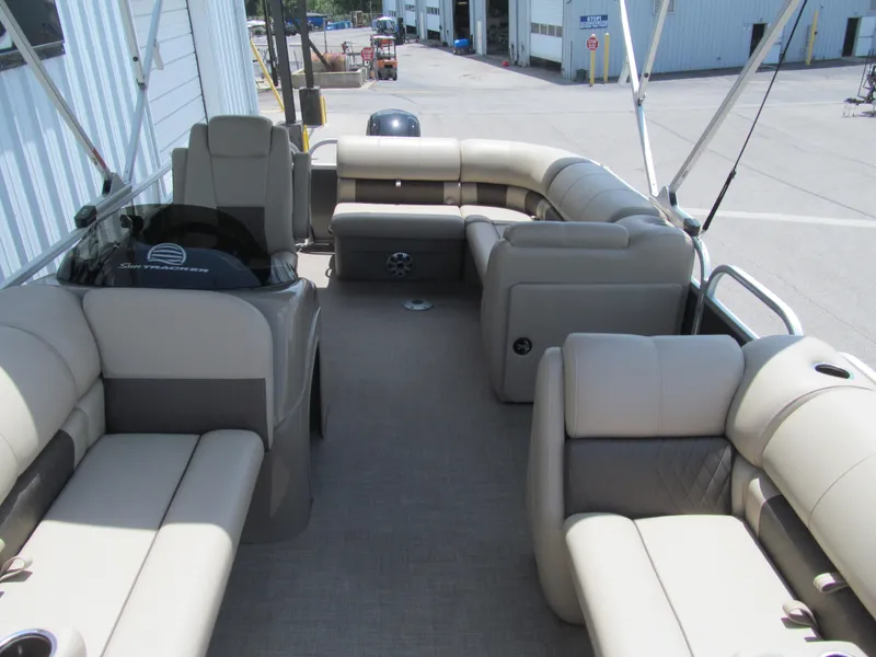 Slide: The Image of 2023 Sun Tracker Party Barge 20 DLX interior with spacious seating and modern design. - 9