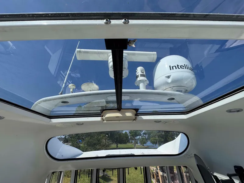 Slide: The Image of Glass roof view from 2001 Carver 506 Motor Yacht, showcasing radar equipment. - 8