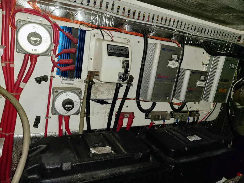 Slide: The Image of Electrical panel of a 2001 Carver 506 Motor Yacht with wiring and switches. - 44