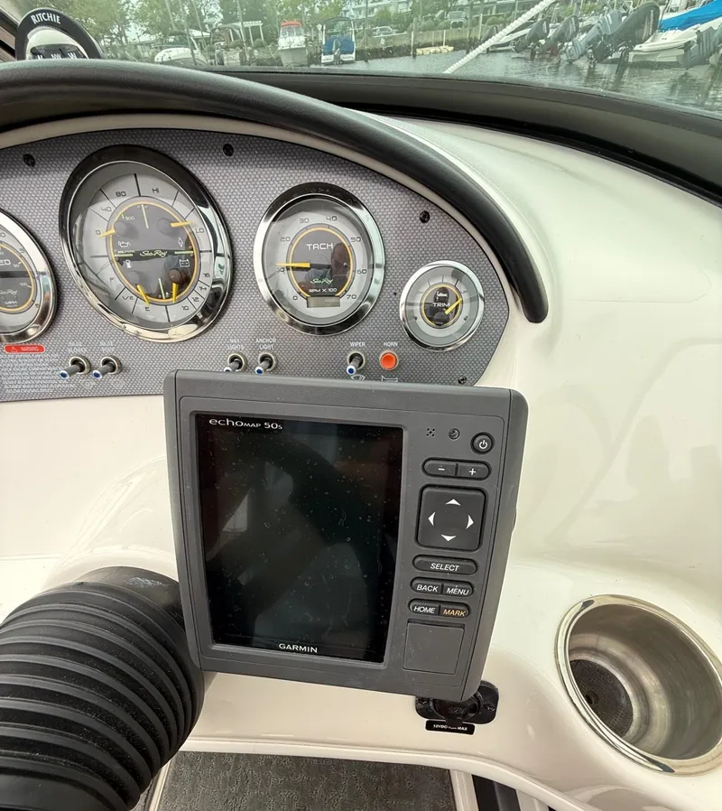 Slide: The Image of Dashboard of a 2014 Sea Ray 205 Sport boat with Garmin navigation system. - 9