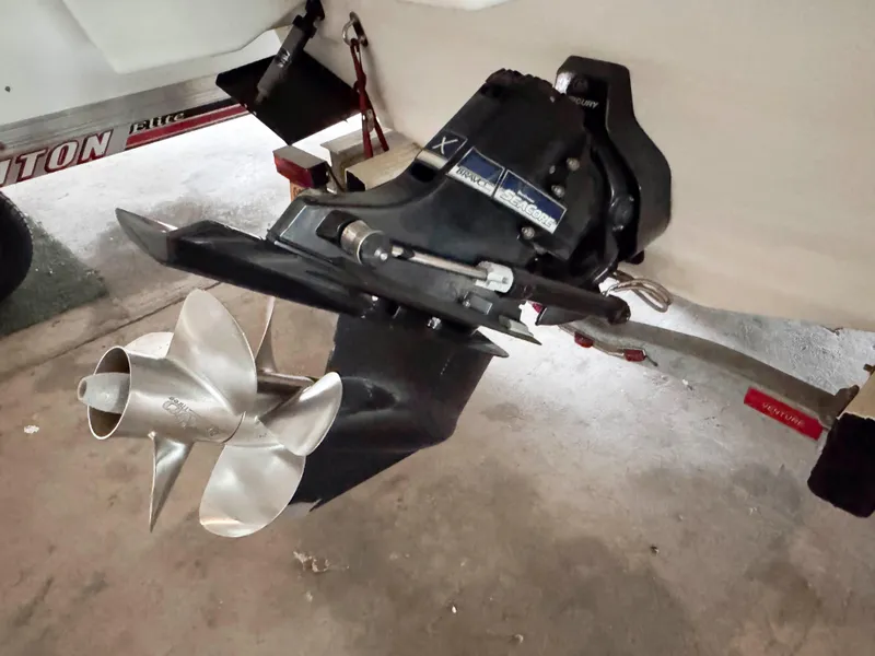 Slide: The Image of 2016 Formula 290 Bowrider boat propeller and drive system in a garage. - 22