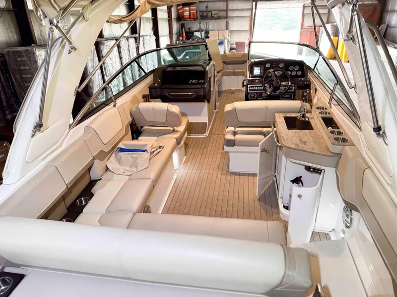 Slide: The Image of 2016 Formula 290 Bowrider interior with luxurious seating and modern dashboard in a garage setting. - 3