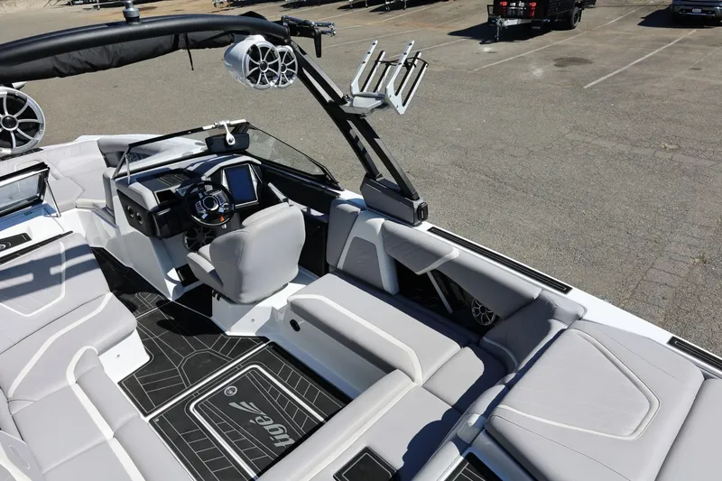 Slide: The Image of 2021 Tigé 22RZX boat interior with sleek design and modern dashboard. - 21