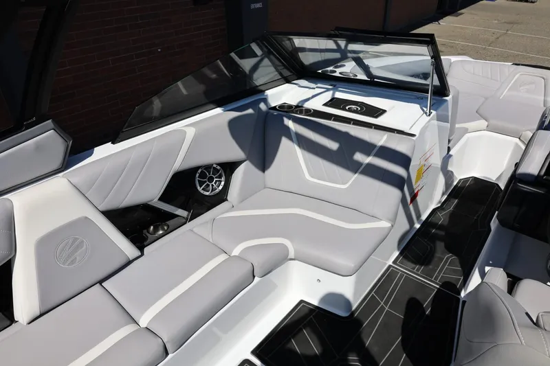 Slide: The Image of 2021 Tigé 22RZX boat interior with sleek gray seating and modern design. - 24