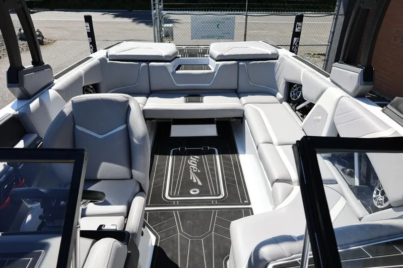 Slide: The Image of 2021 Tigé 22RZX boat interior with luxurious seating and modern design. - 34