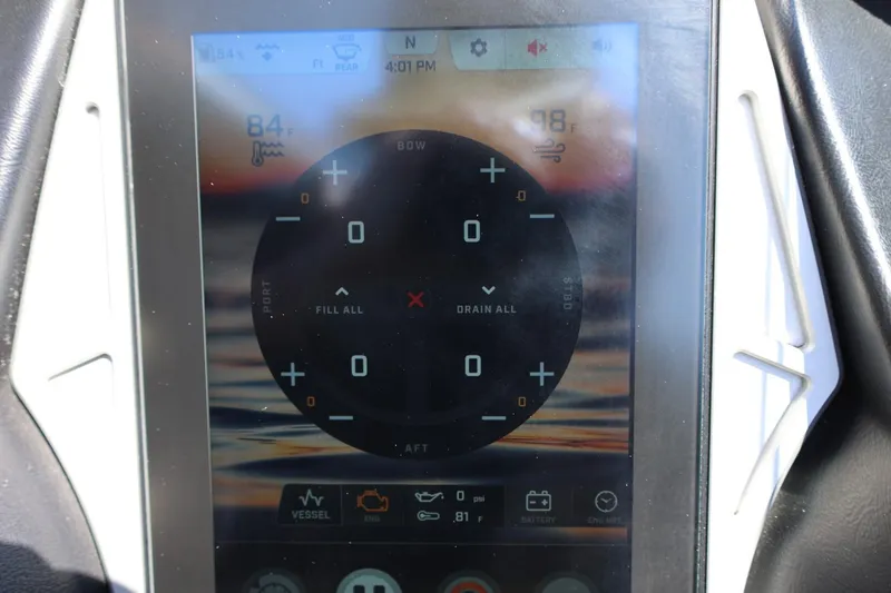 Slide: The Image of Touchscreen control panel of a 2021 Tigé 22RZX boat displaying settings and information. - 38