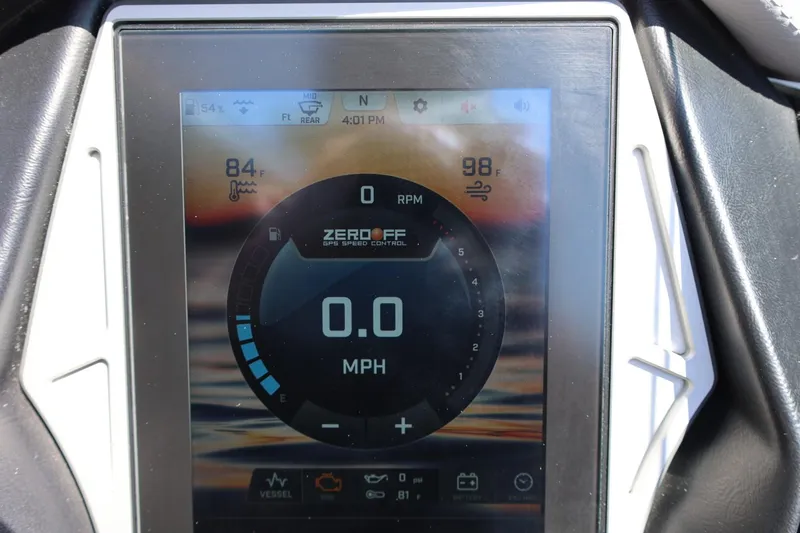 Slide: The Image of Dashboard display of a 2021 Tigé 22RZX boat showing speed, temperature, and controls. - 39