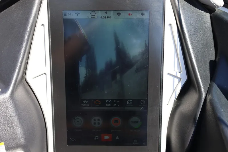 Slide: The Image of Touchscreen display of a 2021 Tigé 22RZX boat showing navigation and control settings. - 43