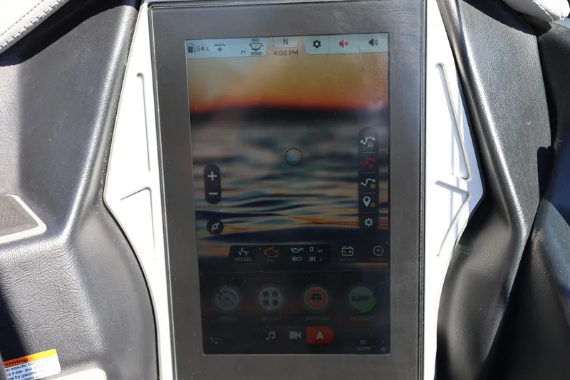 Slide: The Image of Touchscreen display in 2021 Tigé 22RZX boat showing control interface. - 44