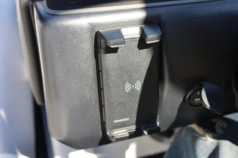 Slide: The Image of Dashboard phone holder with wireless charging in 2021 Tigé 22RZX boat. - 45