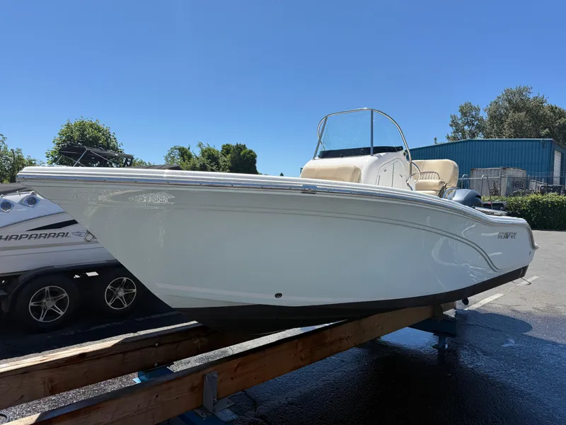Slide: The Image of 2018 Sea Fox 186 Commander boat displayed outdoors on a sunny day. - 3
