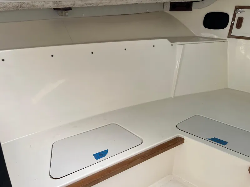Slide: The Image of Interior of a 1992 Blackfin 29 Flybridge boat, featuring storage compartments. - 24